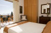 The seperate bedroom with a double bed in Villa Vasia